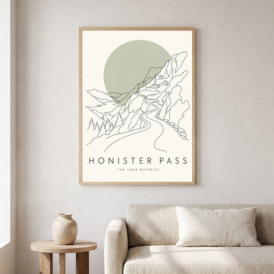 Honister Pass travel poster in a natural frame, hanging in a living