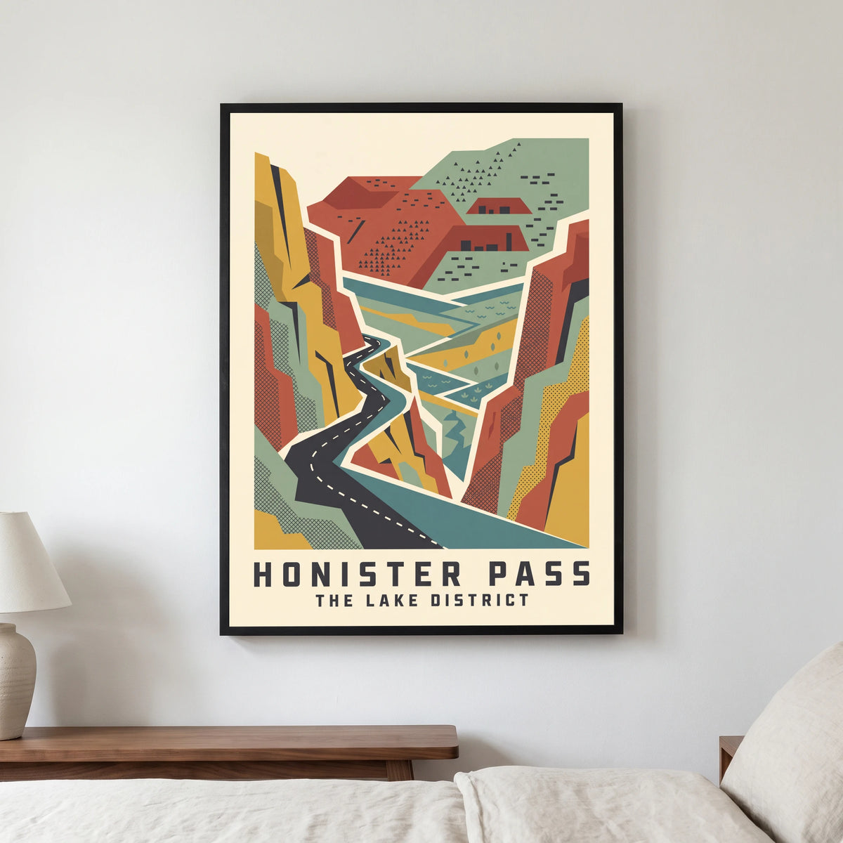Honister Pass travel poster in a black frame, hanging in a bedroom3