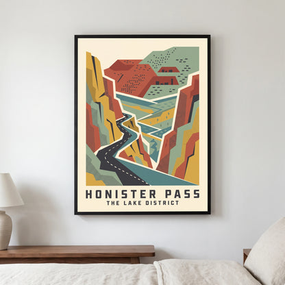 Honister Pass travel poster in a black frame, hanging in a bedroom3