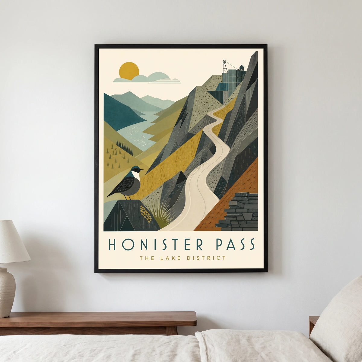 Honister Pass travel poster in a black frame, hanging in a bedroom3
