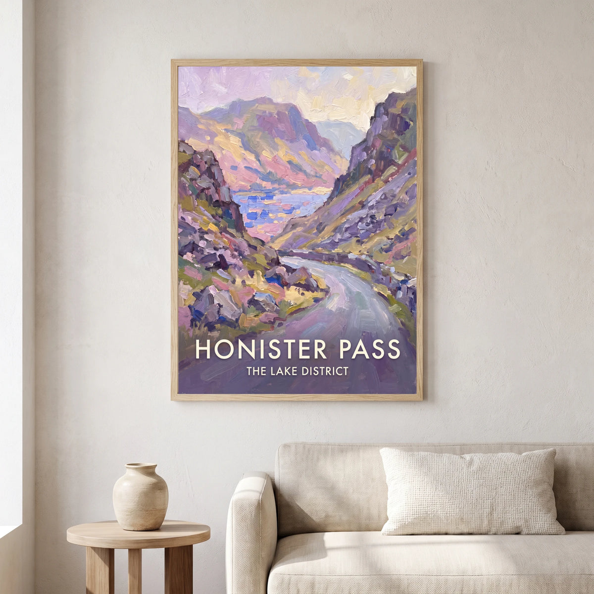 Honister Pass travel poster in a natural frame, hanging in a living