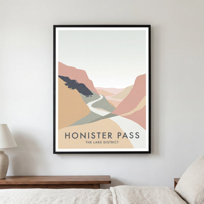 Honister Pass travel poster in a black frame, hanging in a bedroom3