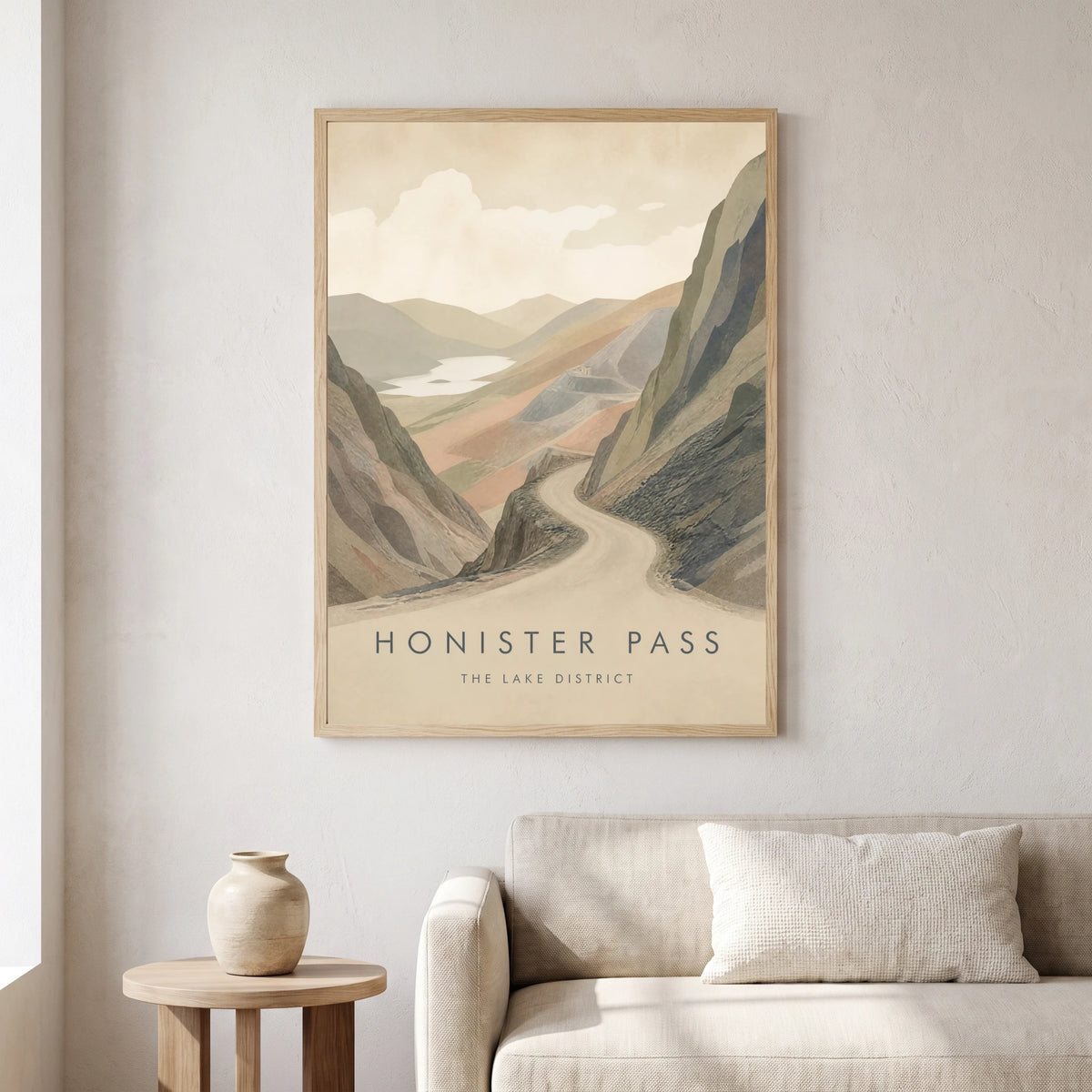 Honister Pass travel poster in a natural frame, hanging in a living