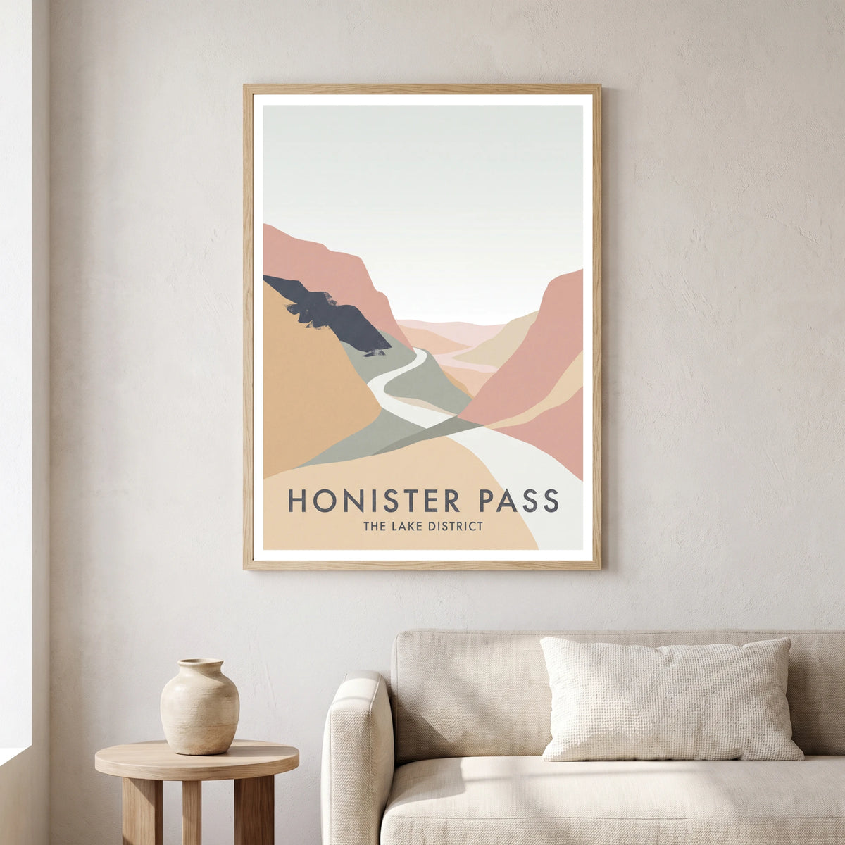 Honister Pass travel poster in a natural frame, hanging in a living