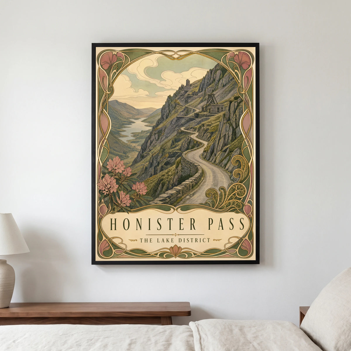 Honister Pass travel poster in a black frame, hanging in a bedroom3