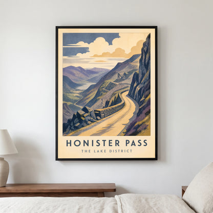Honister Pass travel poster in a black frame, hanging in a bedroom3