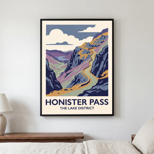 Honister Pass travel poster in a black frame, hanging in a bedroom3
