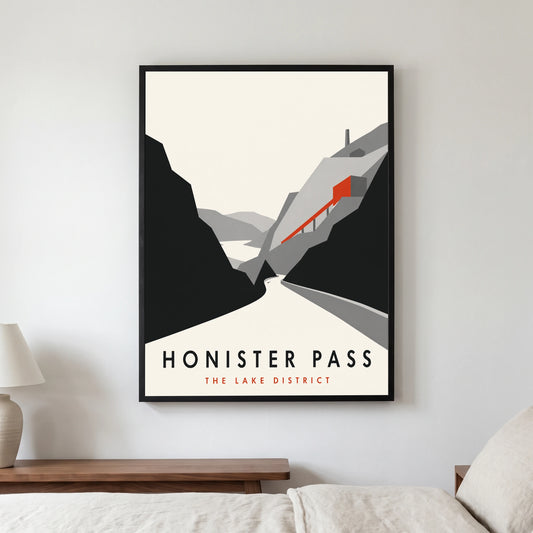 Honister Pass travel poster in a black frame, hanging in a bedroom3