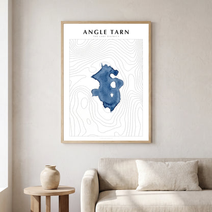 Angle Tarn lake map poster in a natural frame, hanging in a living