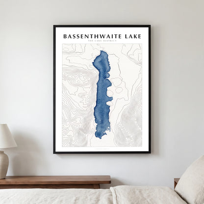 Bassenthwaite Lake lake map poster in a black frame, hanging in a bedroom