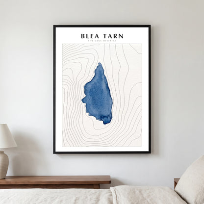 Blea Tarn lake map poster in a black frame, hanging in a bedroom