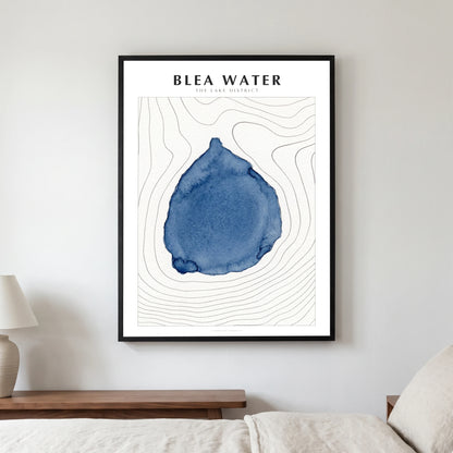 Blea Water lake map poster in a black frame, hanging in a bedroom