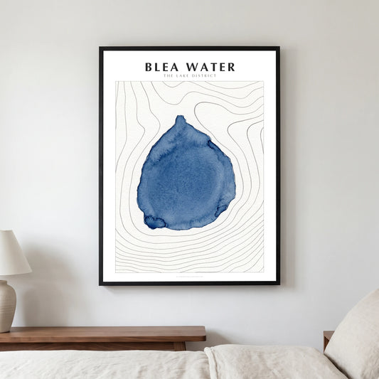 Blea Water lake map poster in a black frame, hanging in a bedroom