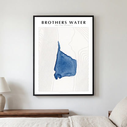 Brothers Water lake map poster in a black frame, hanging in a bedroom
