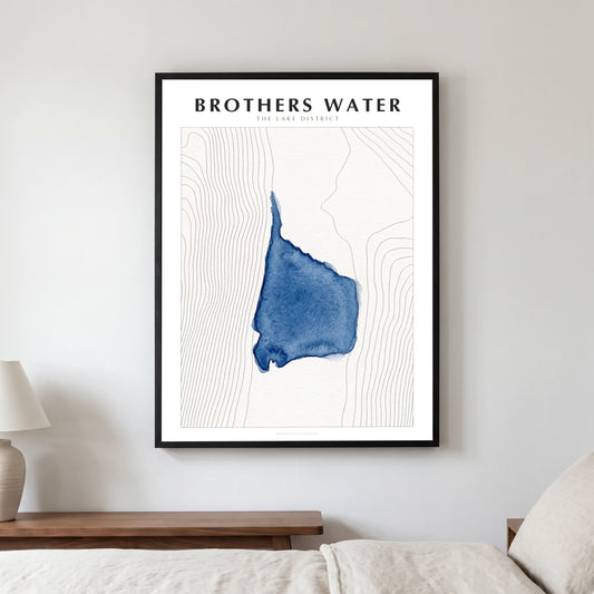 Brothers Water lake map poster in a black frame, hanging in a bedroom