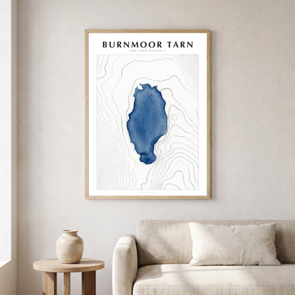 Burnmoor Tarn lake map poster in a natural frame, hanging in a living