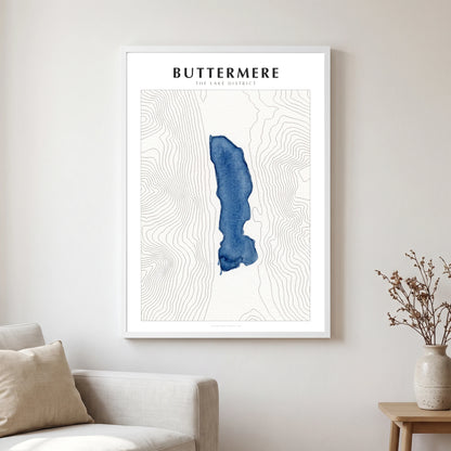 Buttermere lake map poster in a white frame, hanging in a living