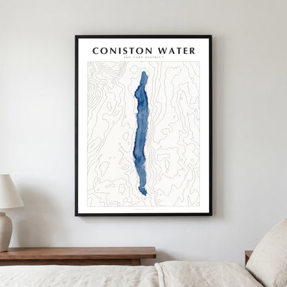Coniston Water lake map poster in a black frame, hanging in a bedroom