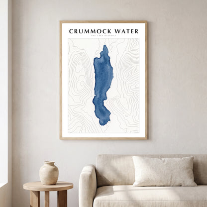 Crummock Water lake map poster in a natural frame, hanging in a living