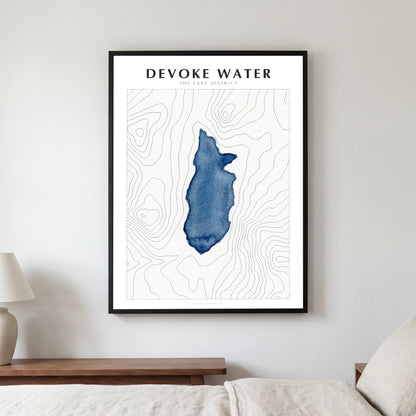 Devoke Water lake map poster in a black frame, hanging in a bedroom