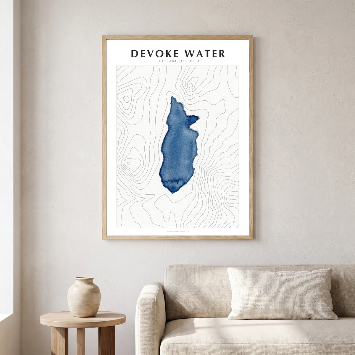 Devoke Water lake map poster in a natural frame, hanging in a living