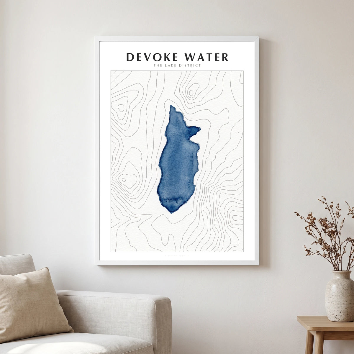 Devoke Water lake map poster in a white frame, hanging in a living