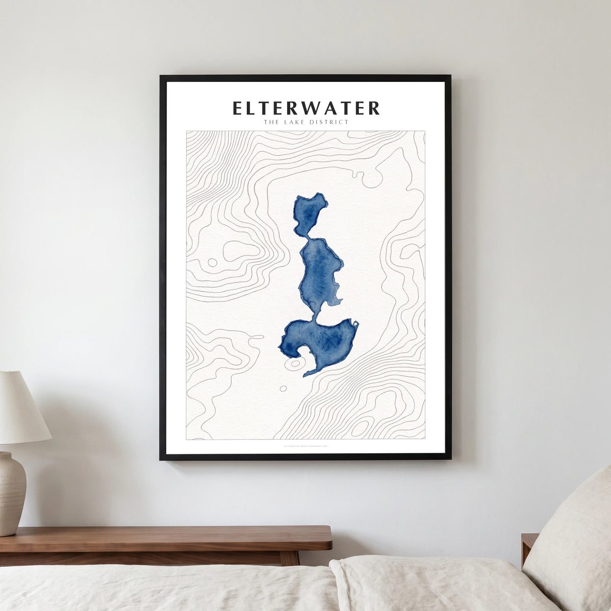 Elterwater lake map poster in a black frame, hanging in a bedroom