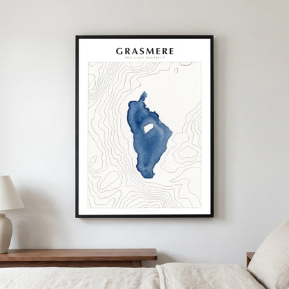 Grasmere lake map poster in a black frame, hanging in a bedroom