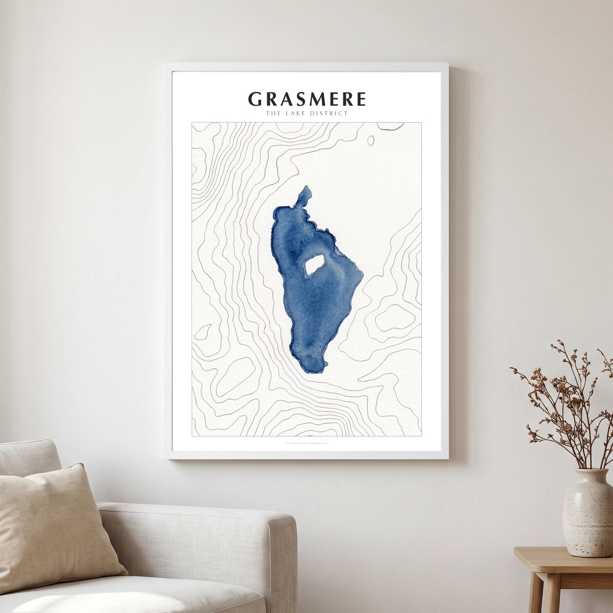 Grasmere lake map poster in a white frame, hanging in a living