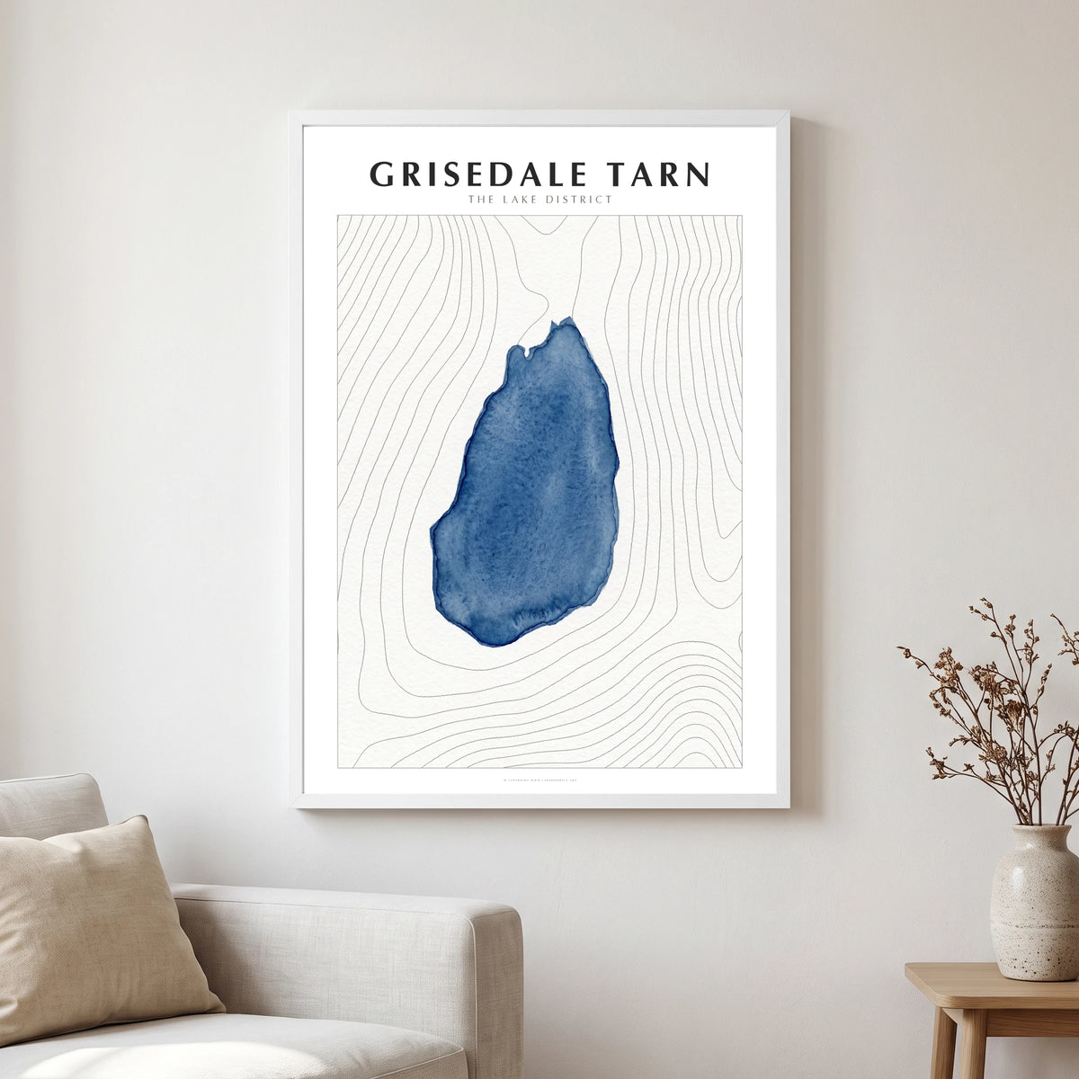 Grisedale Tarn lake map poster in a white frame, hanging in a living