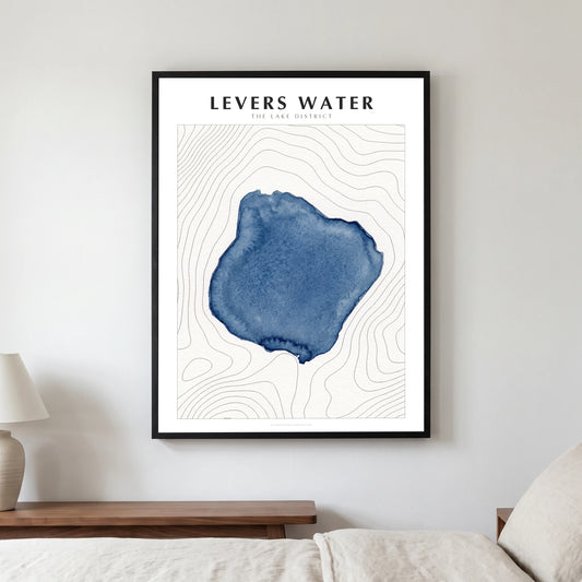 Levers Water lake map poster in a black frame, hanging in a bedroom