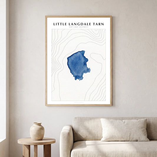 Little Langdale Tarn lake map poster in a natural frame, hanging in a living