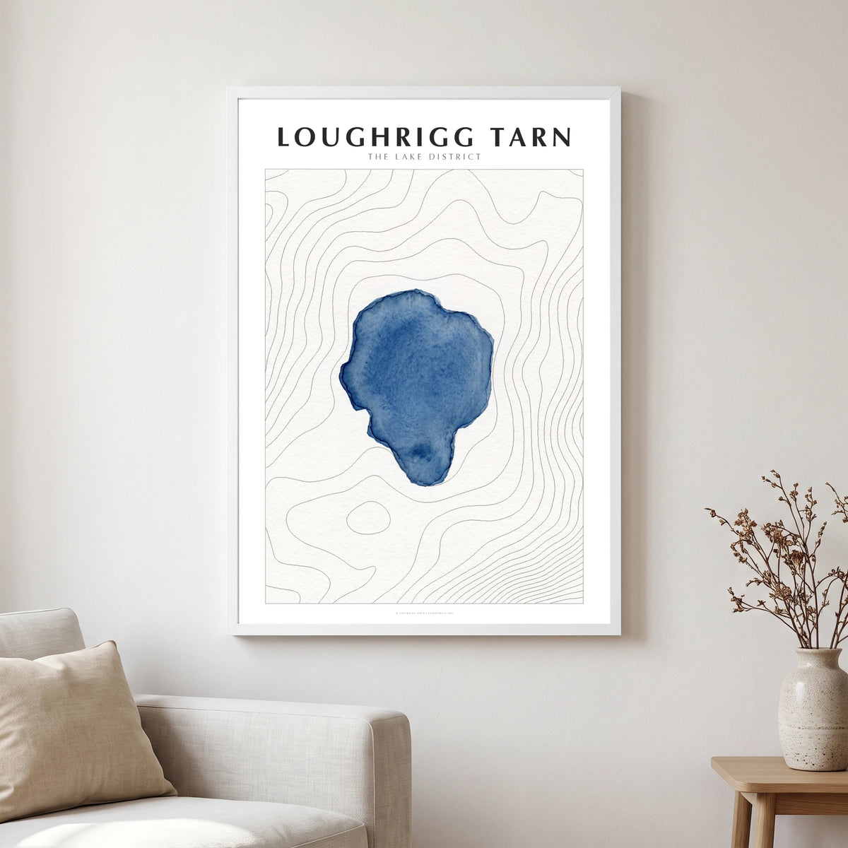 Loughrigg Tarn lake map poster in a white frame, hanging in a living