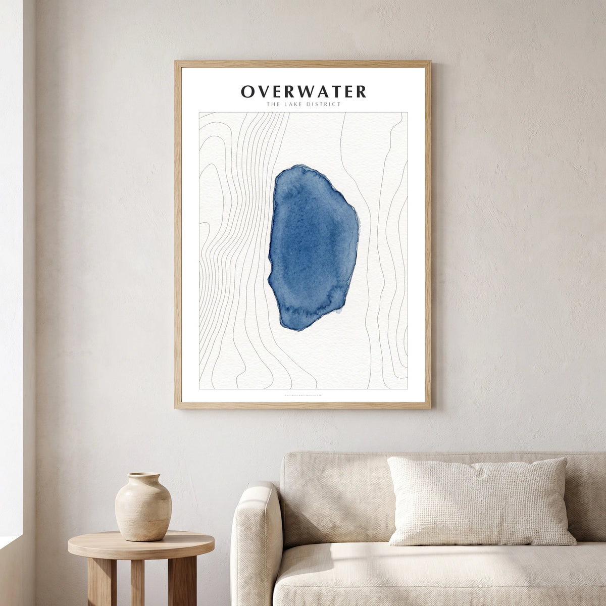 Overwater lake map poster in a natural frame, hanging in a living