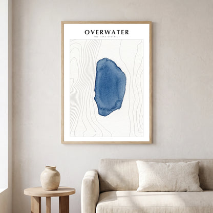 Overwater lake map poster in a natural frame, hanging in a living