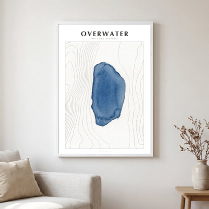 Overwater lake map poster in a white frame, hanging in a living