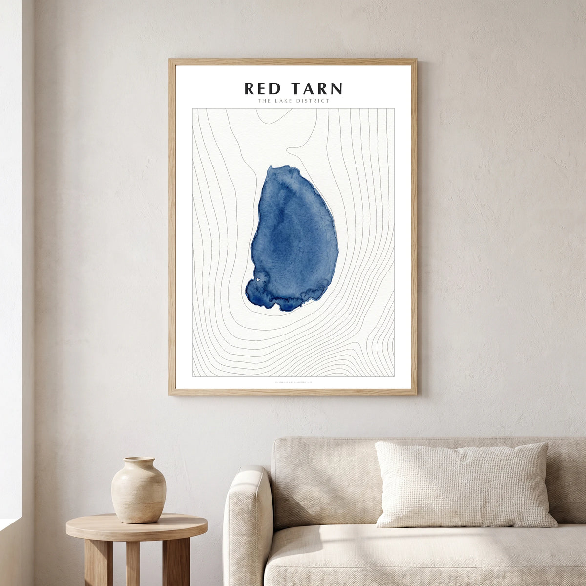 Red Tarn lake map poster in a natural frame, hanging in a living