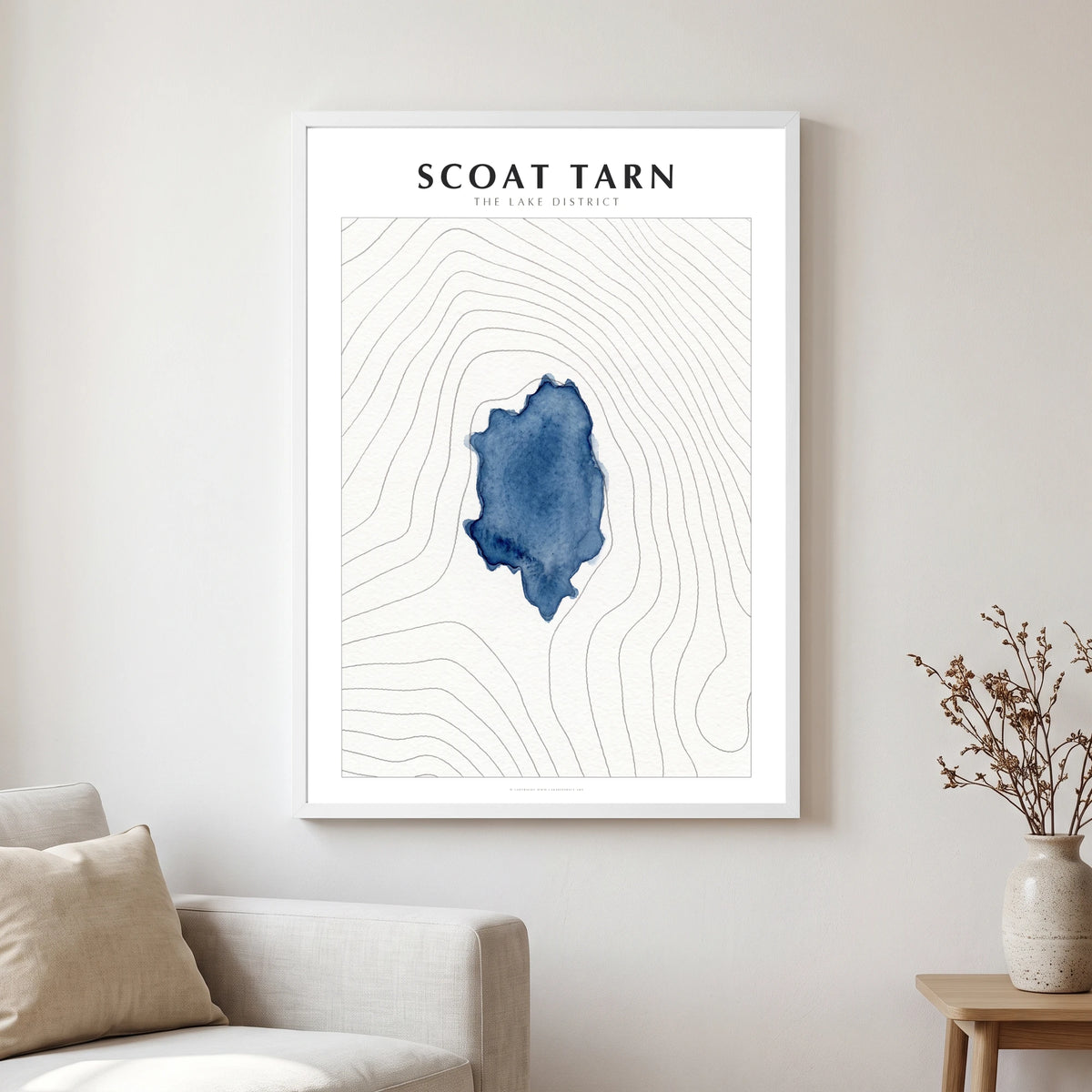 Scoat Tarn lake map poster in a white frame, hanging in a living