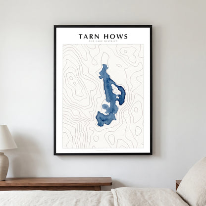 Tarn Hows lake map poster in a black frame, hanging in a bedroom