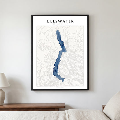 Ullswater lake map poster in a black frame, hanging in a bedroom