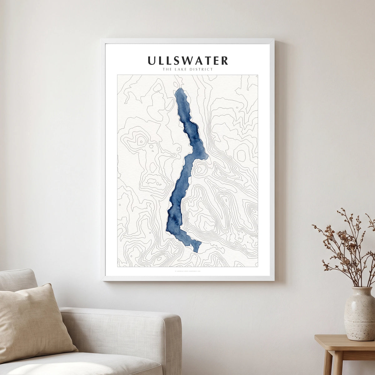 Ullswater lake map poster in a white frame, hanging in a living