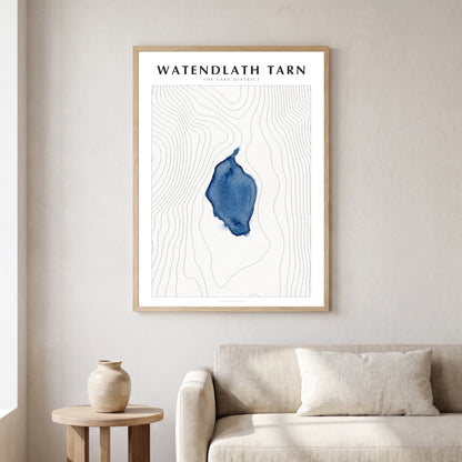 Watendlath Tarn lake map poster in a natural frame, hanging in a living