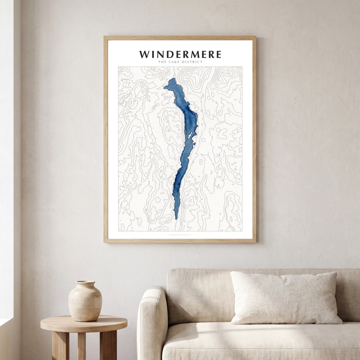 Windermere lake map poster in a natural frame, hanging in a living