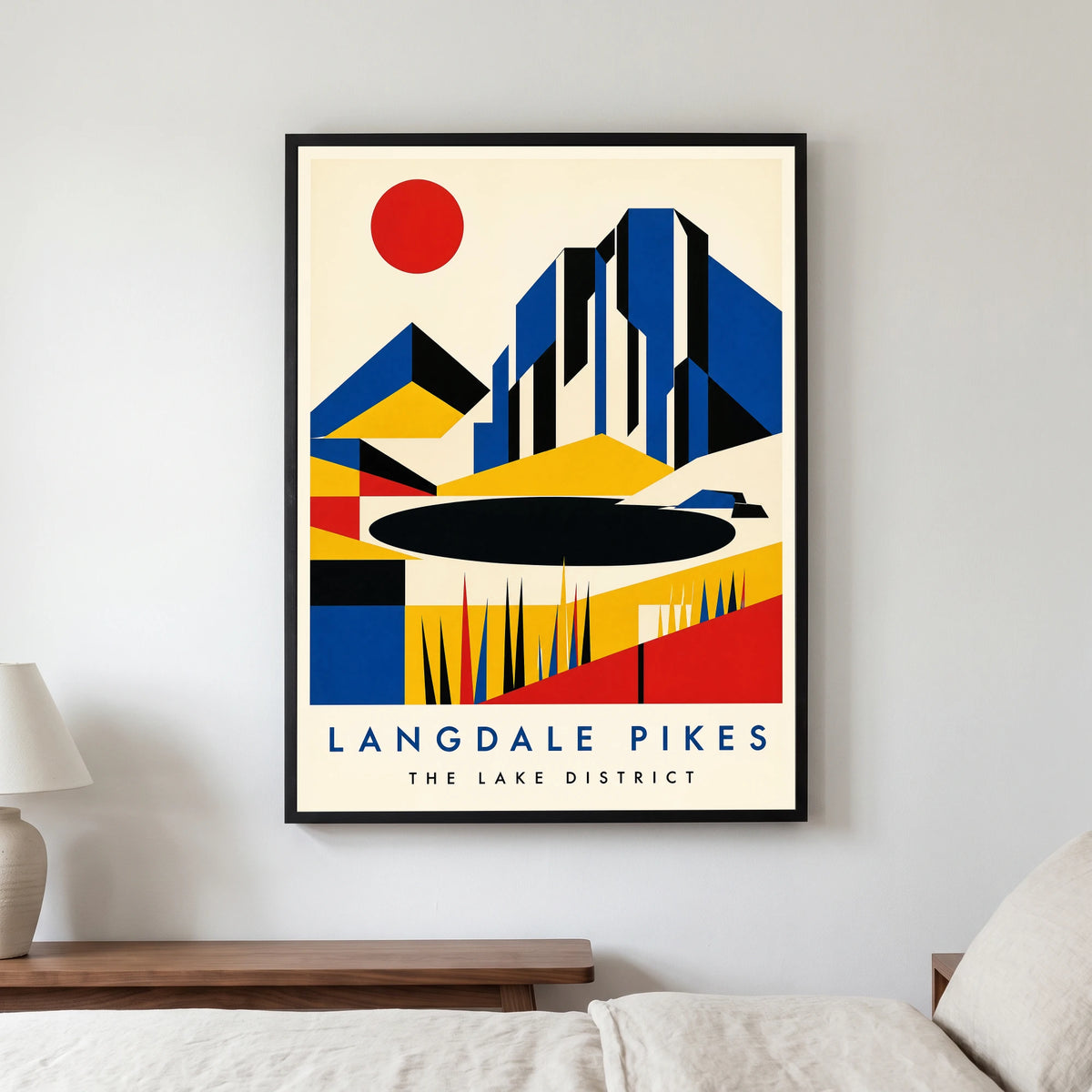 Langdale Pikes travel poster in a black frame, hanging in a bedroom3