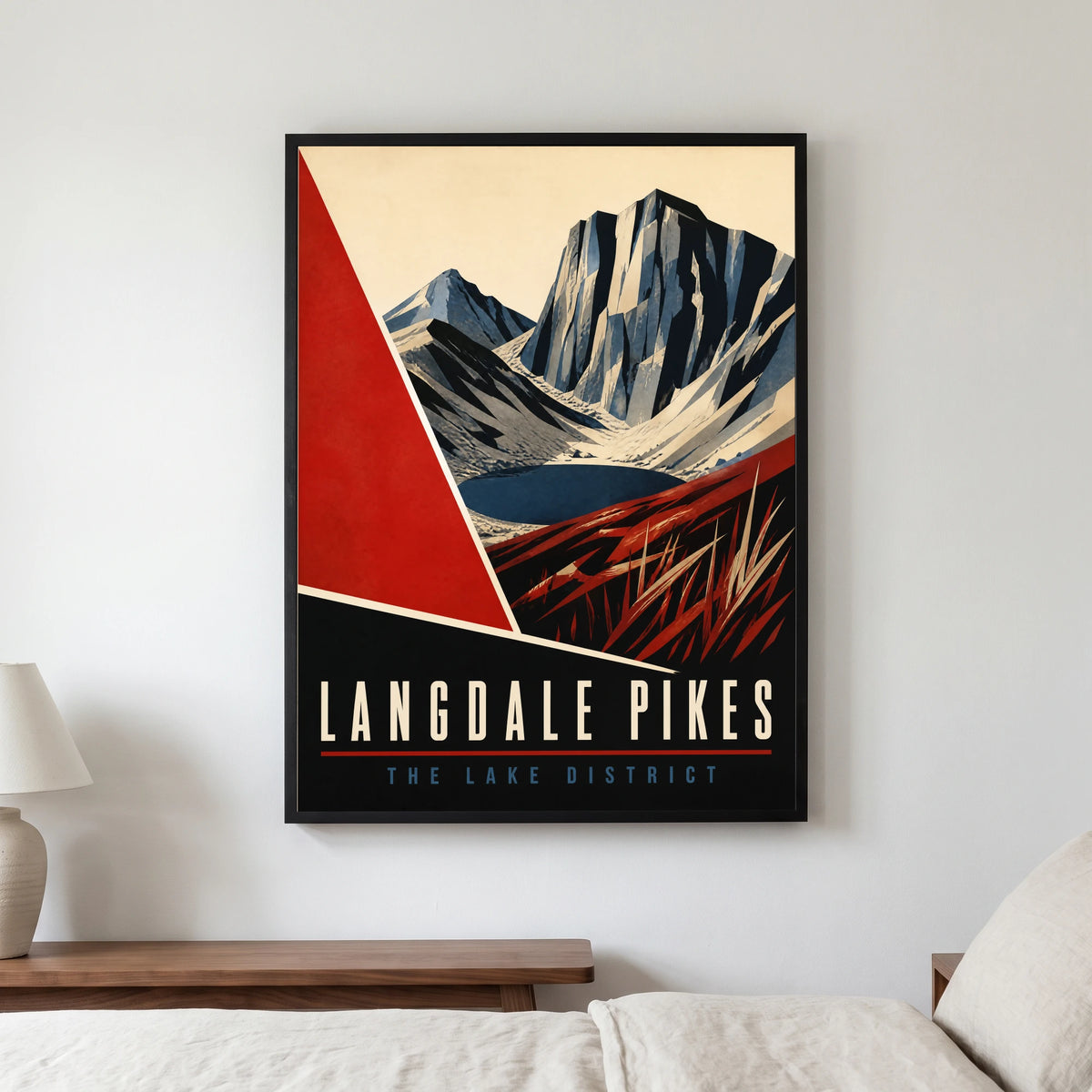 Langdale Pikes travel poster in a black frame, hanging in a bedroom3