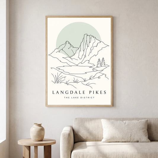 Langdale Pikes travel poster in a natural frame, hanging in a living