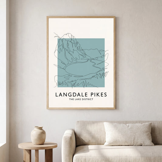 Langdale Pikes travel poster in a natural frame, hanging in a living