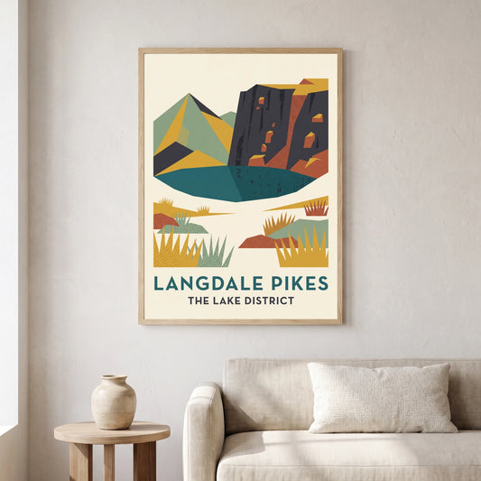 Langdale Pikes travel poster in a natural frame, hanging in a living