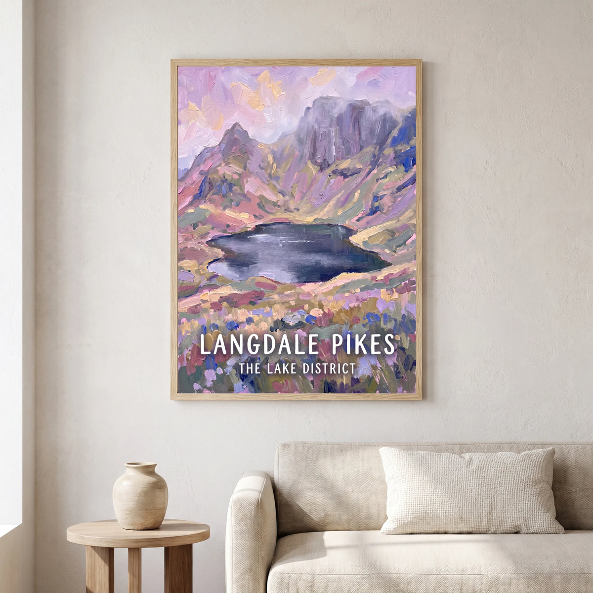 Langdale Pikes travel poster in a natural frame, hanging in a living