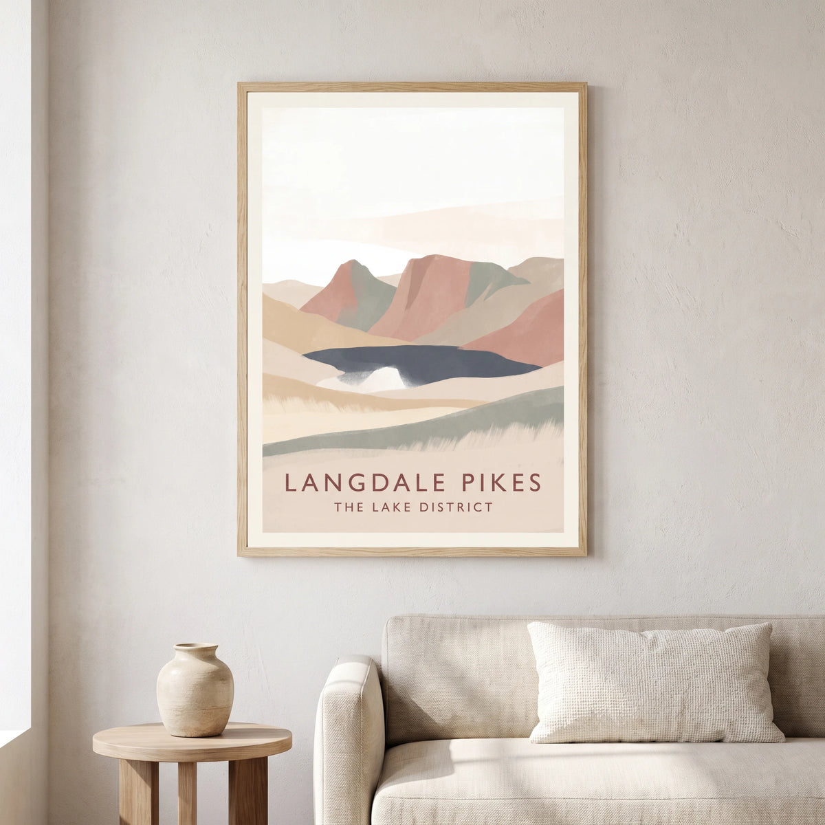 Langdale Pikes travel poster in a natural frame, hanging in a living